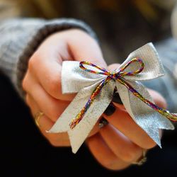 Close-up of hand holding umbrella