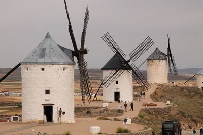 Traditional windmill against sky