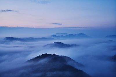 Scenic view of mountains against sky during sunset