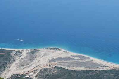 High angle view of beach against blue sky