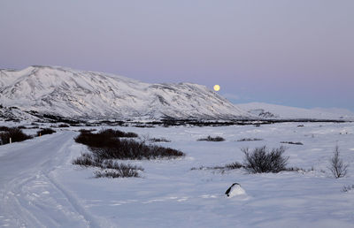 Snow covered mountain against sky