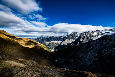 Scenic view of snowcapped mountains against sky