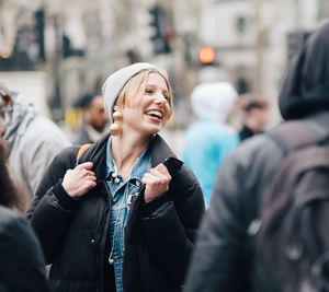 Young couple looking at city street