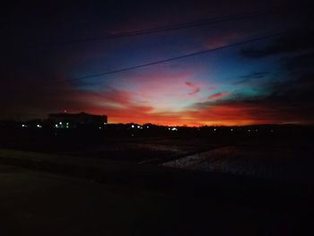 Silhouette of road at sunset