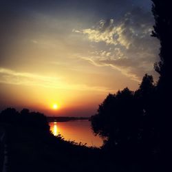 Scenic view of sunset over river