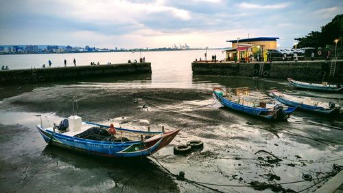 Boats moored in sea