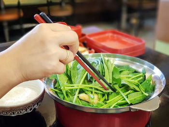 Close-up of hand holding food