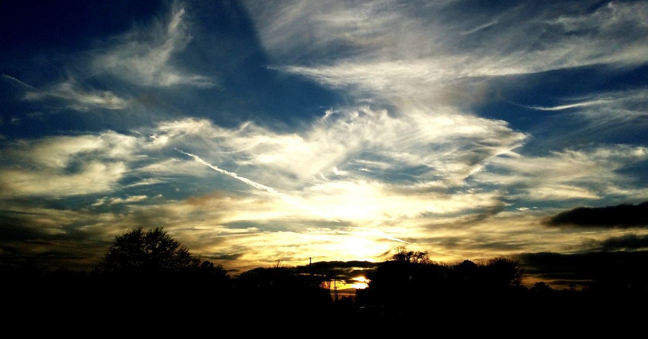 silhouette, sky, sunset, beauty in nature, scenics, tranquility, tranquil scene, tree, cloud - sky, nature, cloud, cloudy, idyllic, sunlight, low angle view, landscape, sun, outdoors, dramatic sky, sunbeam