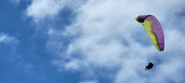 Low angle view of kite flying in sky