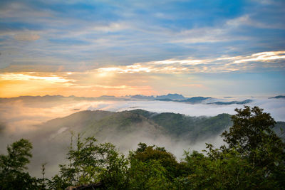 Scenic view of mountains against sky during sunset