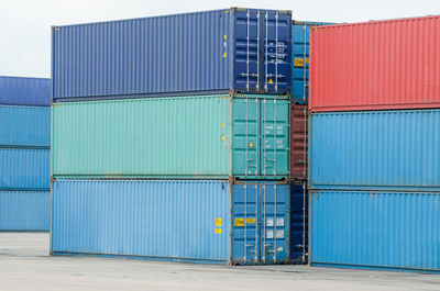 Stack of metallic structure on pier at harbor