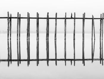 Close-up of metal fence during winter