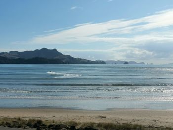 Scenic view of beach against sky