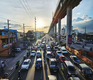 High angle view of traffic on road at sunset