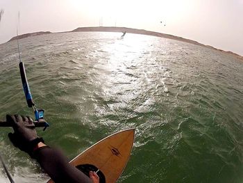 Cropped image of boat sailing in sea