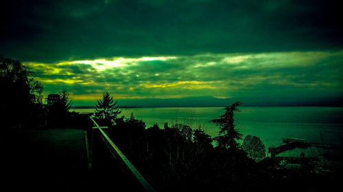 Scenic view of sea against cloudy sky