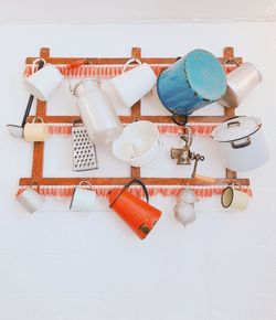 High angle view of kitchen objects against white background