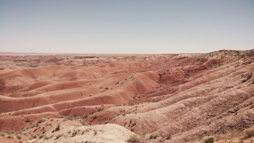 Scenic view of desert against clear sky