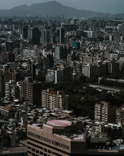 High angle view of buildings in city against sky