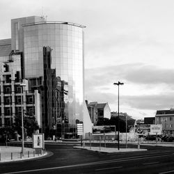 Buildings in city against sky