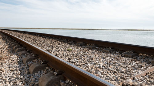 Railroad tracks against sky