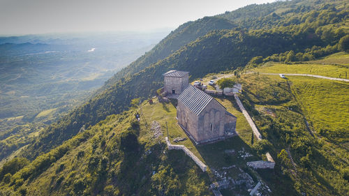 High angle view of mountain against sky monastery, whose house, mountains, trees