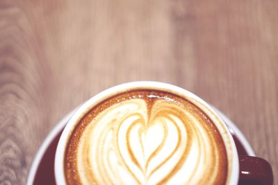 Close-up of cappuccino on table