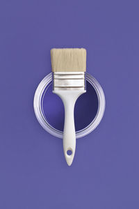 High angle view of dental equipment against blue background