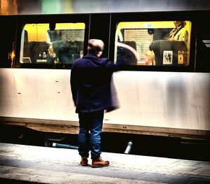 Full length of woman standing on ground