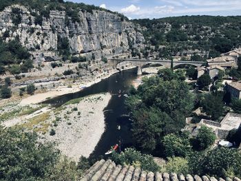 High angle view of river amidst trees.  balazuc,  ardèche france.