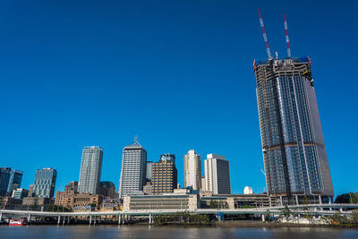 View of buildings against blue sky