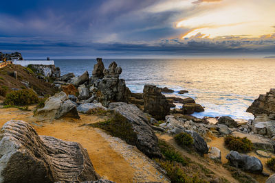 Scenic view of sea against sky during sunset