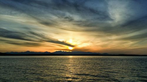 Scenic view of sea at sunset