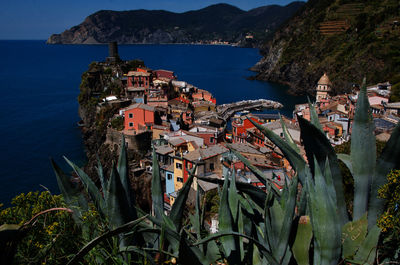 High angle view of townscape by sea