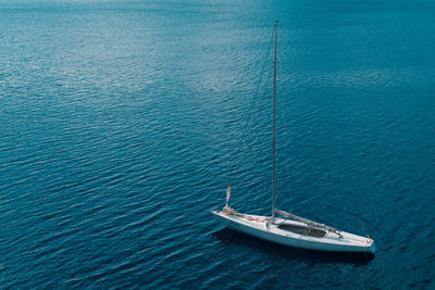 High angle view of sailboat sailing on sea