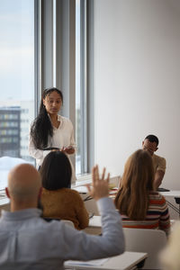 Business people having business seminar