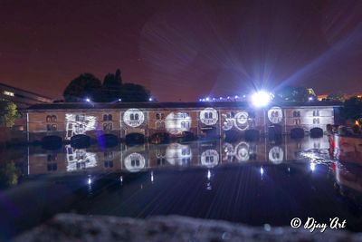 View of illuminated city at night