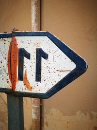 Close-up of rusty sign