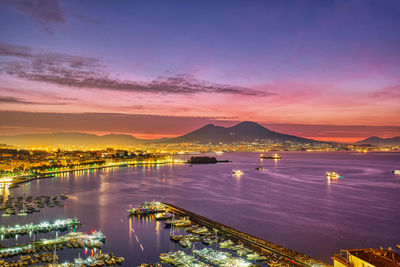 Dramatic sunrise in naples with mount vesuvius in the back