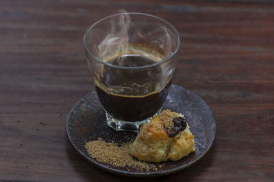 Close-up of drink served on table