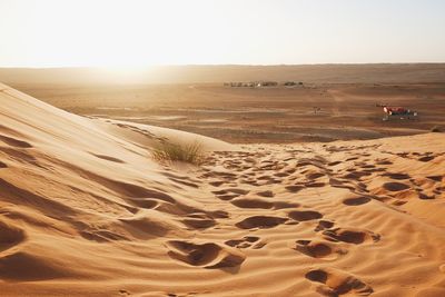 Scenic view of desert against clear sky