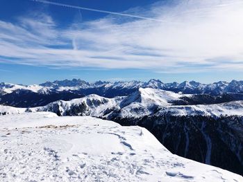 Scenic view of snowcapped mountains against sky