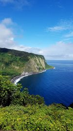 Scenic view of sea against blue sky