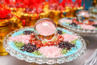 High angle view of multi colored candies on table