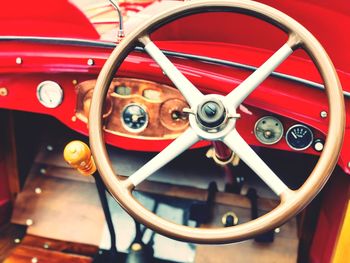 Close-up of red vintage car