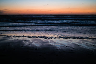 Sand beach at the atlantic ocean in the last day of light