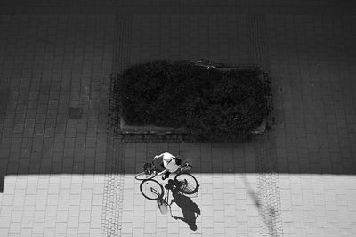 Man riding bicycle on city street 