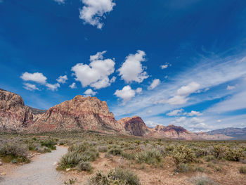 Scenic view of arid landscape against sky