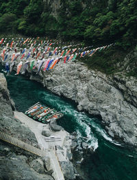 High angle view of people enjoying in river