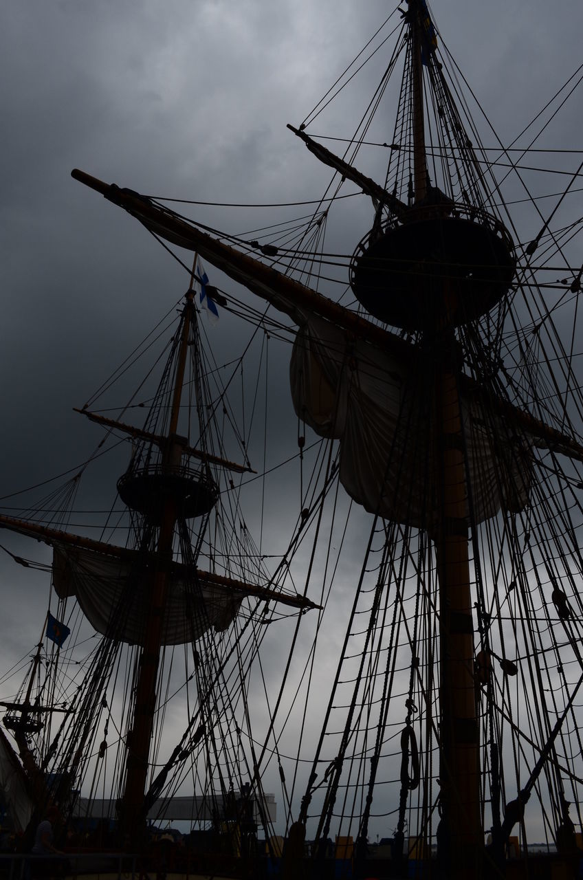 LOW ANGLE VIEW OF SHIP MOORED AT HARBOR